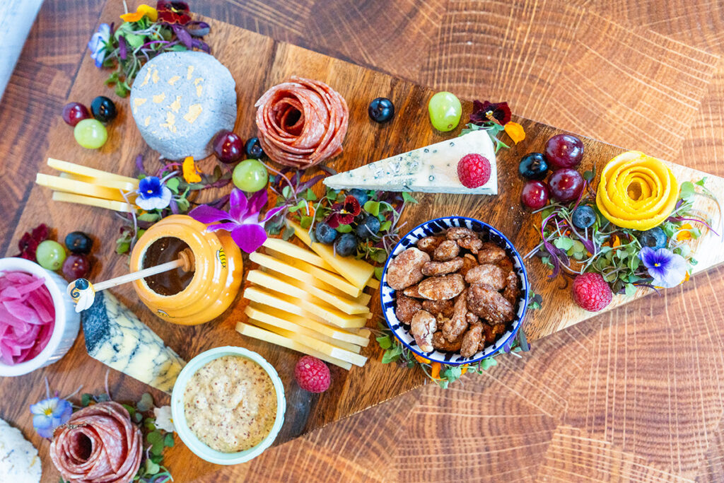 charcuterie spread with a variety of meats, cheeses, and fruit