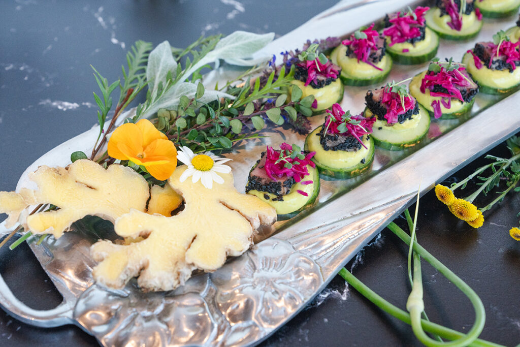 fine dining appetizer of cucumber topped ahi tuna