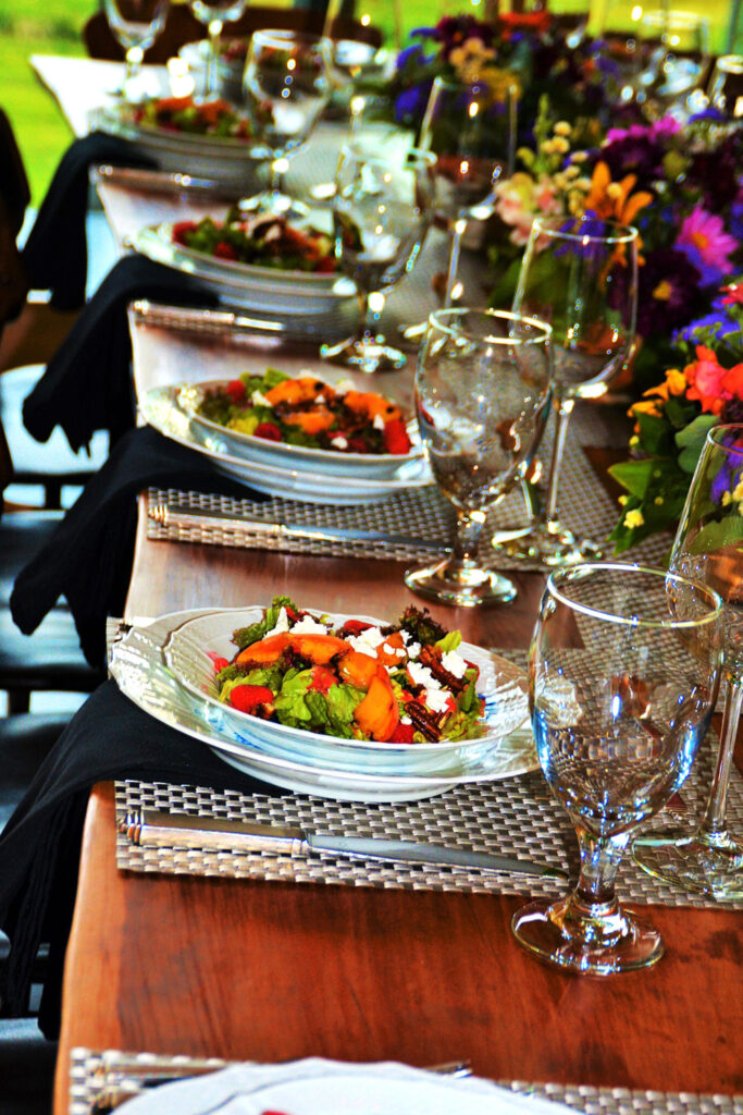 table setting with fresh salad starters