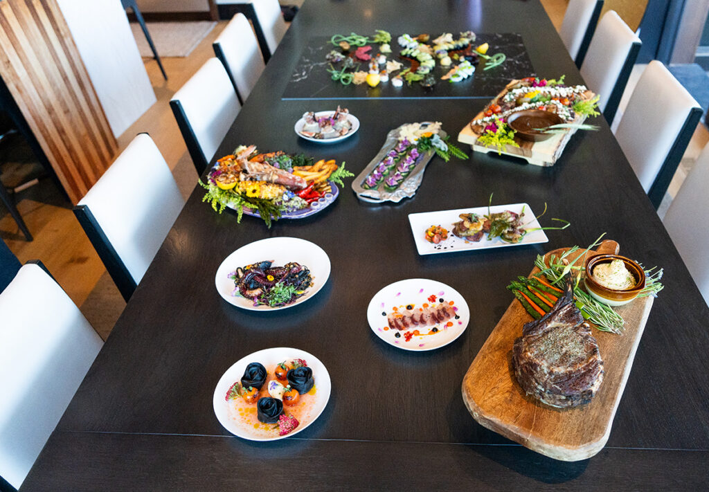 Table setting with a variety of different entrees