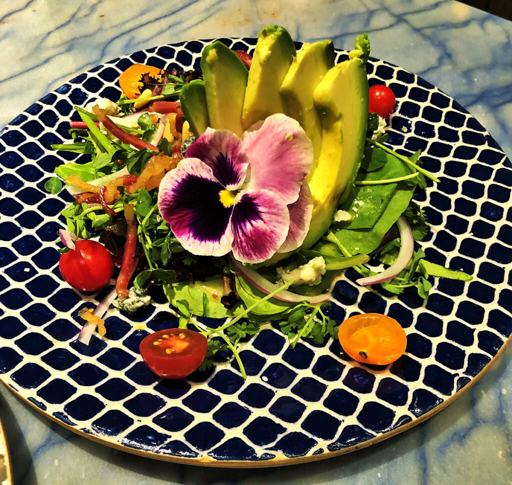 fresh spring mix salad with tomatoes and avocado