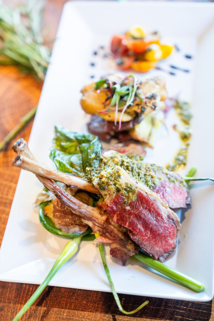 Braised lamb chops atop greens